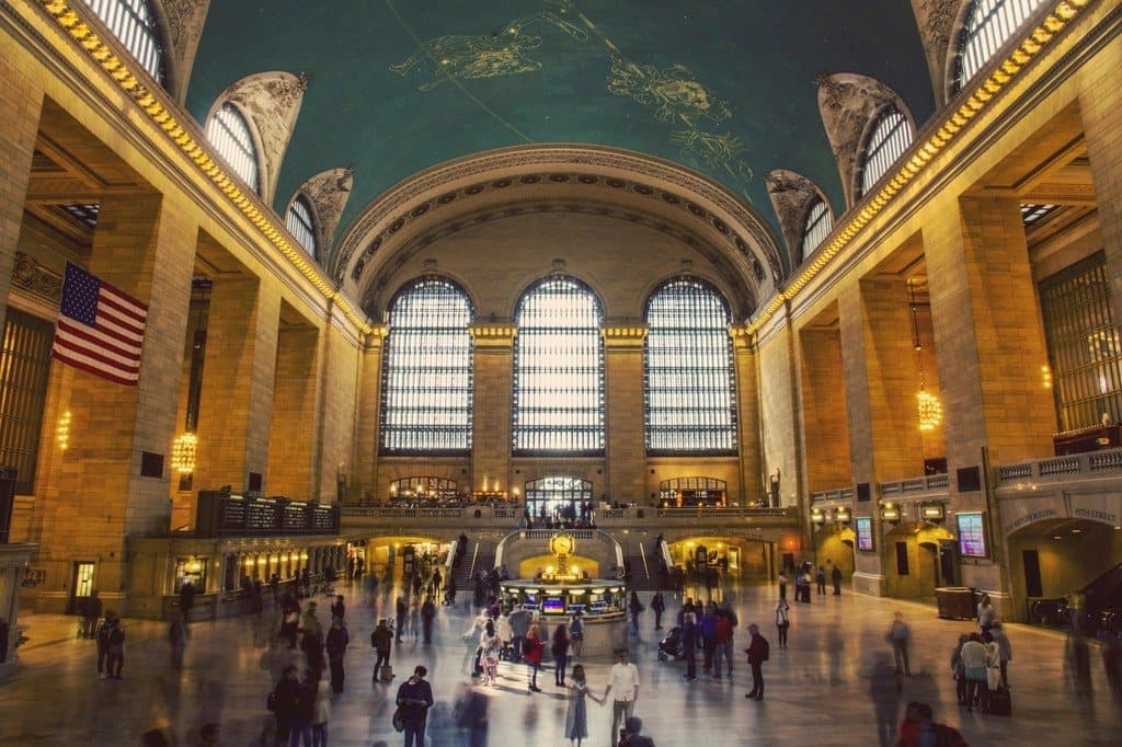A station hall seen from a high camera, with every person detected